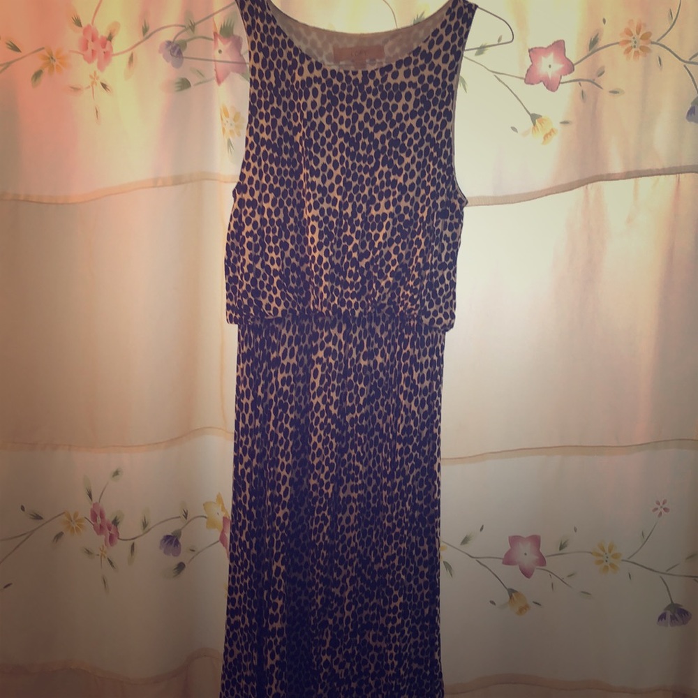 Sleeveless polka dot midi dress